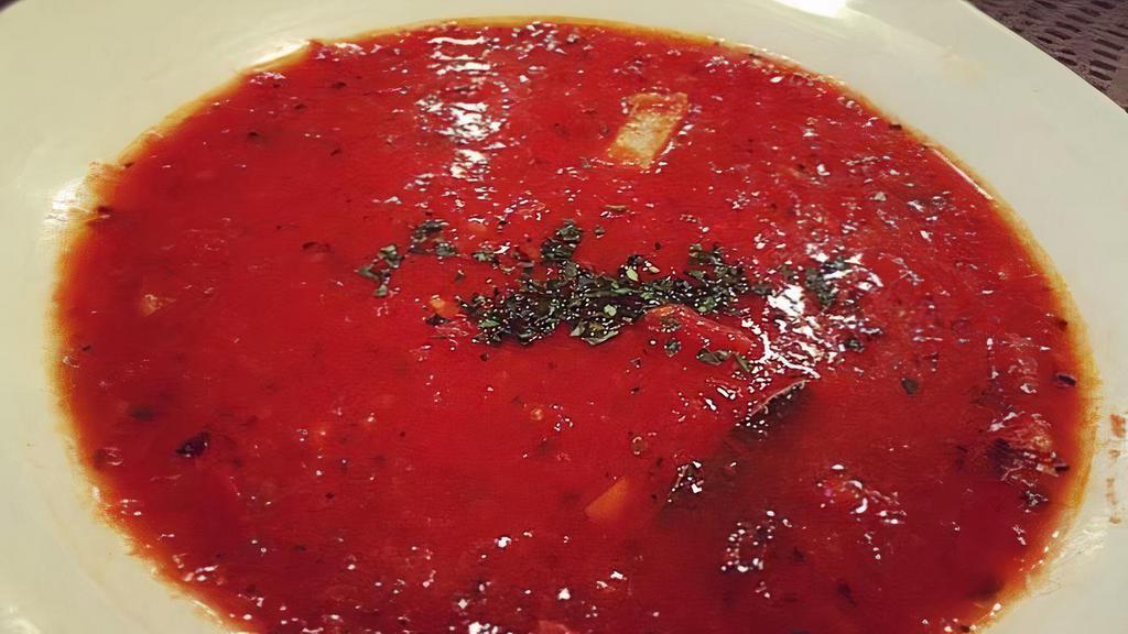 Pappa Al Pomodoro · Our tuscan fresh tomato, garlic, black pepper, and diced bread soup.