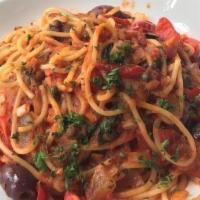 Spaghetti Puttanesca · Spaghetti tossed with our putanesca sauce of calamata olives, anchovy, garlic, capers, and l...