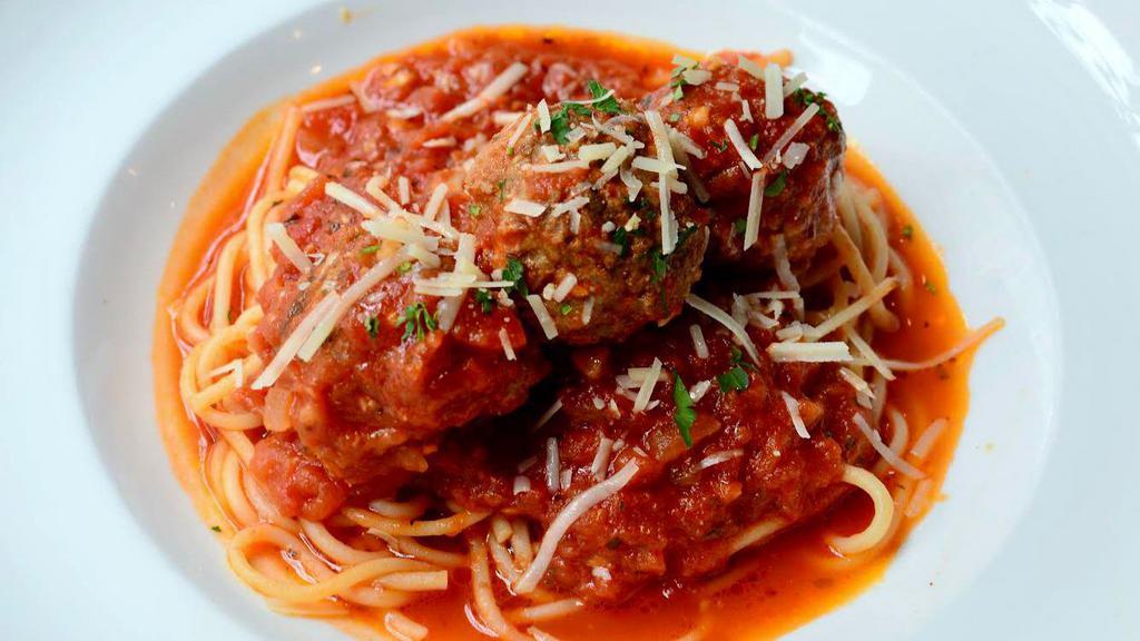Spaghetti Con Polpettone · Housemade meatballs and our tomato gravy served over spaghetti.