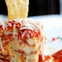 Lasagna Bolognese · Baked layers of fresh lasagna sheets, our bolognese sauce, ricotta, and mozzarella cheeses a...