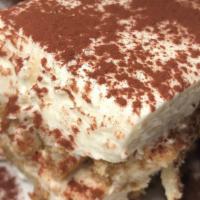 Tiramisu · Our award-winning classic ladyfinger sponge cake soaked in espresso and rum, layered with a ...