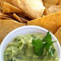 House Made Guacamole & Chips · Fresh avocado, red onion, peppers, cilantro, lime, salt, tortilla chips. Vegan and gluten fr...