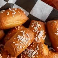 Pretzel Bites* · Served with melted cheddar cheese sauce