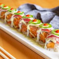 Kiss The Fire · Spicy salmon roll with jalapeno pepper, topped with white tuna and yellowfin tuna. Raw. Hot ...