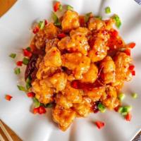 General Gau'S Chicken · The most famous Chinese dish. Lightly-breaded fried chicken with spices, minced garlic and c...