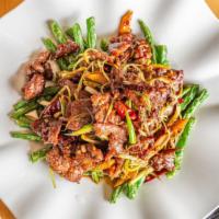 Yue-Yang Beef · Beef tenderloin with string beans in house oyster sauce. Hot and spicy.