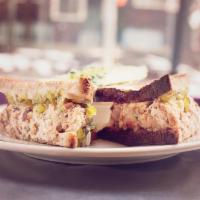 Tuna Melt · house tuna salad, sharp cheddar cheese and sweet pickle relish, on grilled wheat bread