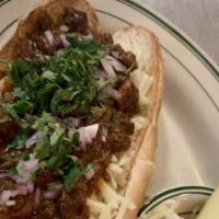 Chili Cheese Dog · grilled pearl all beef dog, jack cheese, texas state penn chili, chopped red onions and cila...