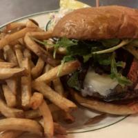 Shroom & Swiss Burger · grilled all beef patty, Swiss cheese, grilled portabella mushrooms, baby arugula and herb ma...
