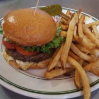 Blue Burger · grilled all beef patty dipped in All Star buffalo sauce, red leaf lettuce, tomatoes and blue...