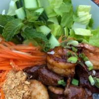 Bun Tom Thit
  · (GF) Vermicelli noodles with grilled pork and shrimp served with lettuce, carrots, cucumber,...