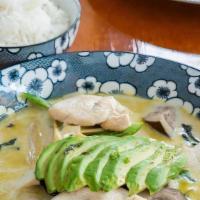 Green Curry · (GF) Spicy green curry with coconut milk, bamboo shoots, basil, Thai chili, eggplant and bel...