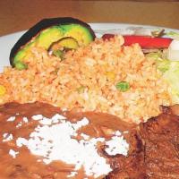 Carne Asada · Marinated beef and grilled (skirt steak) served with cactus, scallions, one chile toreado, r...