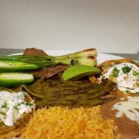 El Patron · Grilled skirt steak, accompanied with two memelitas (Corn shell cover in red and green tomat...