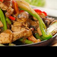 Fajitas Steak Or Chicken · Your choise of protein, bell peppers, onions.
Served with rice and beans, pico de gallo, sou...