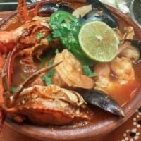 Sopa De Marisco · Seafood soup ( tilapia, shrimp, crab, clams, scallops).