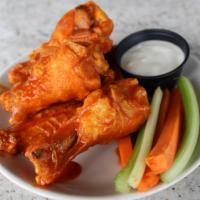 Bone-In Wings · Choose your bone-in wing size, one sauce, ranch or blue cheese and served with carrots & cel...