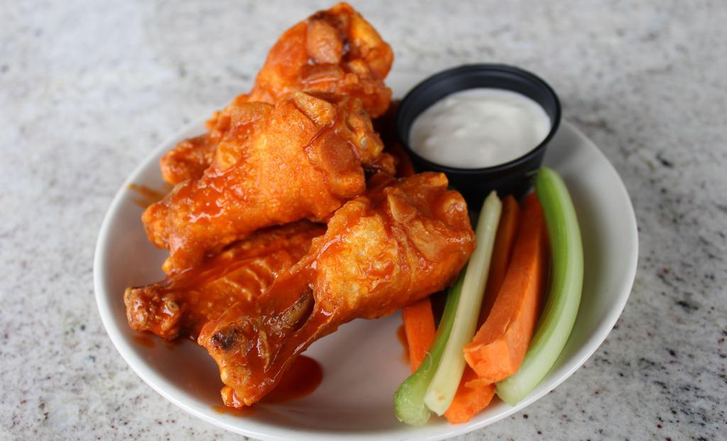 Bone-In Wings · Choose your bone-in wing size, one sauce, ranch or blue cheese and served with carrots & celery sticks