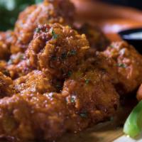 Boneless Wings · Choose your one sauce, ranch or blue cheese and served with carrots & celery sticks