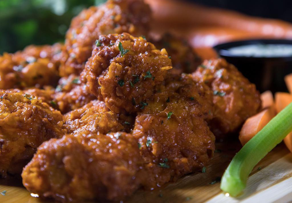 Boneless Wings · Choose your one sauce, ranch or blue cheese and served with carrots & celery sticks