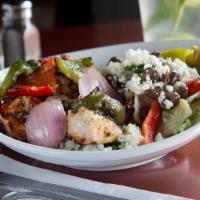 Kabob Tips & Salad With Chicken · Mixed peppers and onions over rice pilaf with a tossed Greek salad