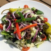 Greek Salad · Feta cheese, red onion, grape tomatoes, pepperoncinis, kalamatas, peppers & garden greens