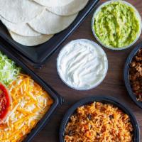 Build Your Own Tacos - Fm Style · Flour tortillas (12), seasoned beef, lettuce, salsa, sour cream & spanish rice
