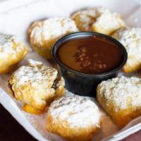 Fried Oreo Puffs - Fm Style · 8 Pieces dusted with powdered sugar & chocolate dipping sauce