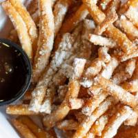 Funnel Cake Fries - Fm Style · Dusted with powdered sugar & chocolate dipping sauce