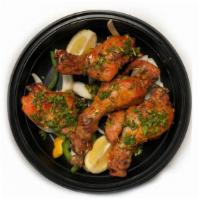Tandoori Chicken Tange · Gluten free. The quintessential bone-in chicken leg pieces marinated in yogurt, ginger, garl...
