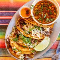 Birria · Favorite. Pan fried corn tortilla taco with beef cheese, onions, and cilantro. Served with a...