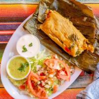 Tamale Plate · Your choice of two tamales: chicken, pork, or veggie. With a side of rice and beans.