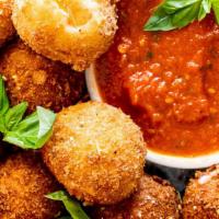 Fried Mozzarella · Fried mozzarella with marinara on the side.