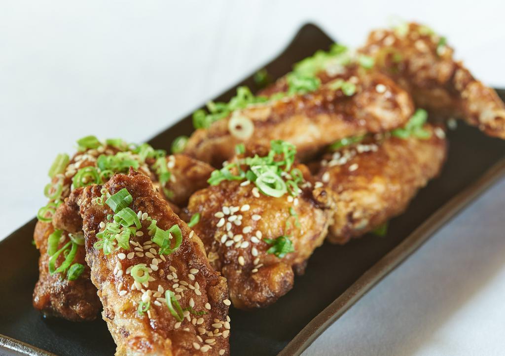 Crispy Chicken Wings · buttermilk brine, choice of sauce. Not safe for: . Gluten, Sesame, Dairy, Allium, Fish, Soy, Cross Contamination. Can be made without: . Sesame, Fish