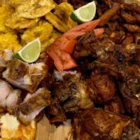 Picadera Dominicana · Longaniza, chicharron de pollo y cerdo, alitas, carne frita de cerdo, queso frito and toston...