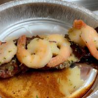Surf & Turf · Grilled churrasco steak and sauté shrimp.