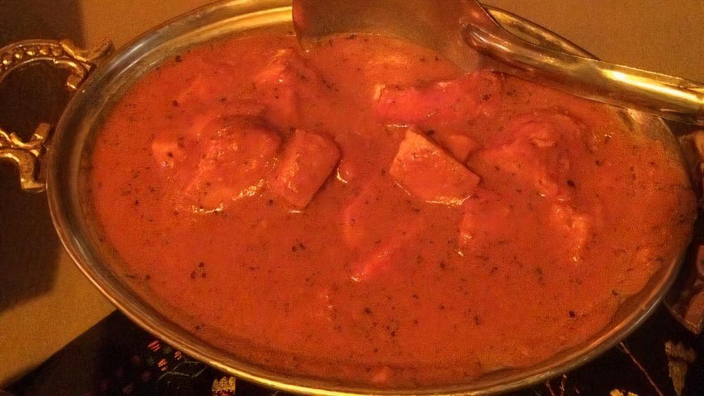 Chick Tikka Masala · Chicken cubes pieces cooked in tikka masala sauce. Aromatic blends of creamy tomato sauce, dry fenugreek leaves and spices. (GF) Served with Basmati Rice.