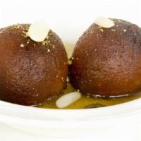 Gulab Jamun · Deep fried wheat and milk balls, soaked in sugar syrup.