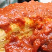 Baked Lasagna · Homemade lasagna layered with mozzarella and ricotta cheeses. Served with your choice of mea...