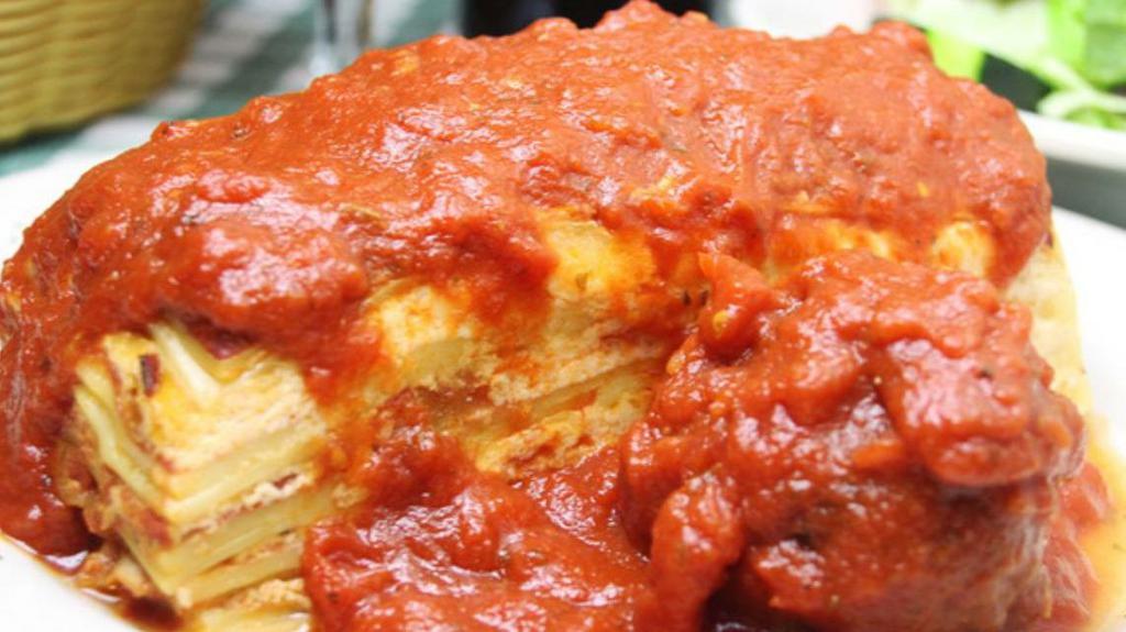 Baked Lasagna · Homemade lasagna layered with mozzarella and ricotta cheeses. Served with your choice of meatballs or sausages.