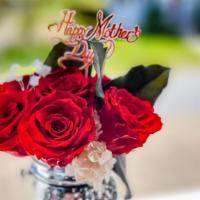 Mason Jar · A fabulous bouquet of 7-8 roses, these stunning blooms are carefully arranged in a pink or s...
