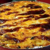 Barbecue Mac (Extra Large) · Choice of crispy chicken or pulled pork, original cheese blend and BBQ sauce.