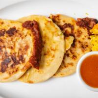 Pupusas · Authentic Salvadoran corn flour tortillas stuffed with cheese with loroco, cheese and beans ...