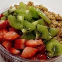 Kwench Bowl · Base: acai/pitaya, banana, kiwi, strawberry, your choice of milk. Toppings: granola and almo...