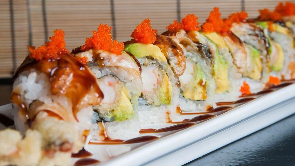Dragon Roll · Eel and avocado wrapped shrimp tempura.