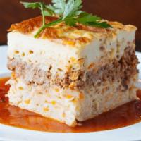 Pastitsio · Pasta, meat sauce, and cheese in a rich bechamel cream and baked.