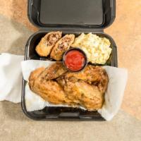 Turkey Wings Smothered · Two sides.