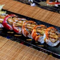 Tokyo · Shrimp Tempura, BBQ Eel, Cucumber. Bluefin Tuna, Salmon, White Tuna & Yellawtail on Top. (6 ...