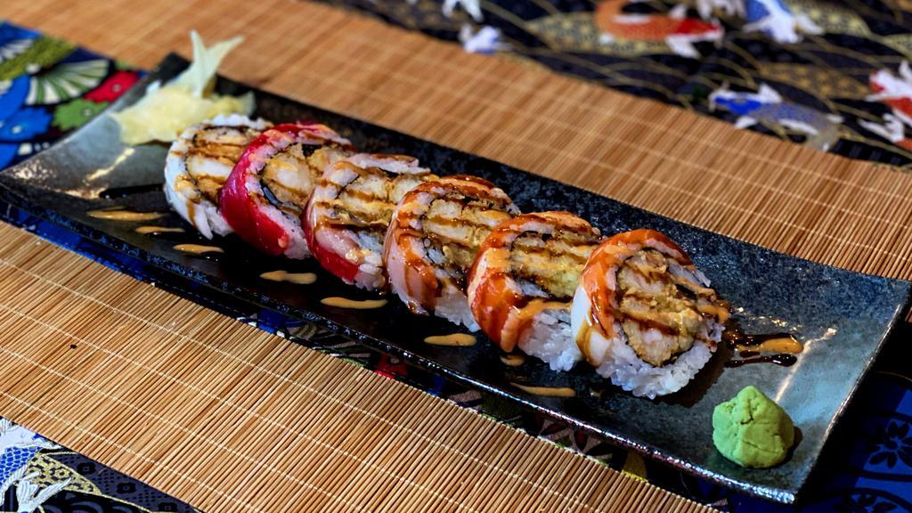 Tokyo · Shrimp Tempura, BBQ Eel, Cucumber. Bluefin Tuna, Salmon, White Tuna & Yellawtail on Top. (6 pcs)