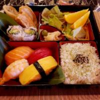 Sushi Bento · Come with  four pieces of California rolls, one piece of veggie spring roll, two pieces of d...